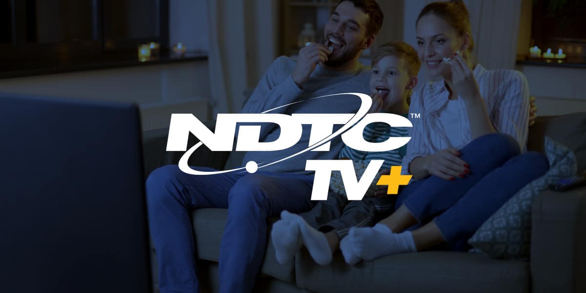 NDTC TV+ logo with a family eating popcorn while watching television